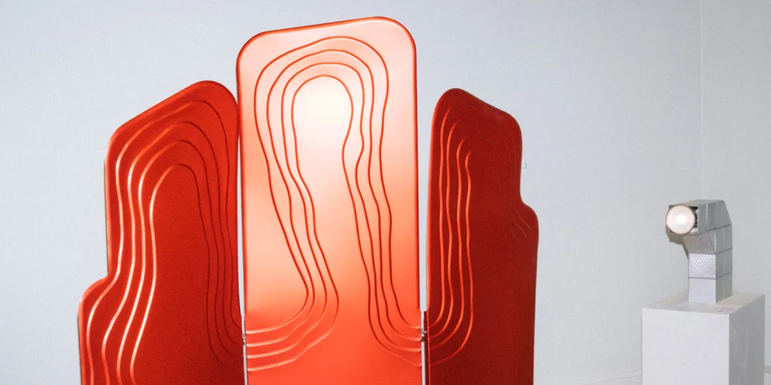 A red sculptural design installation on display during Stockholm Design Week.